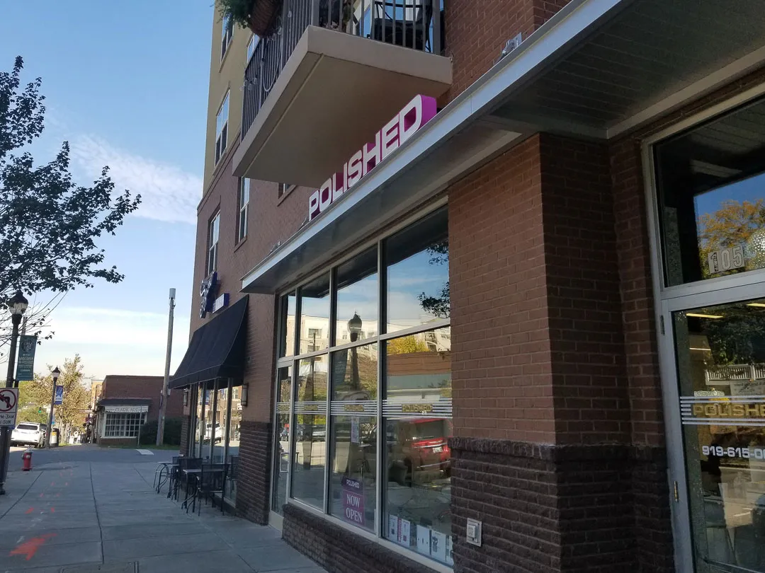 Vertical lit blade sign for Polished