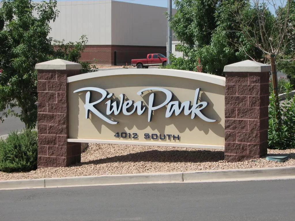 Brick and stone monument with dimensional letters for River Park