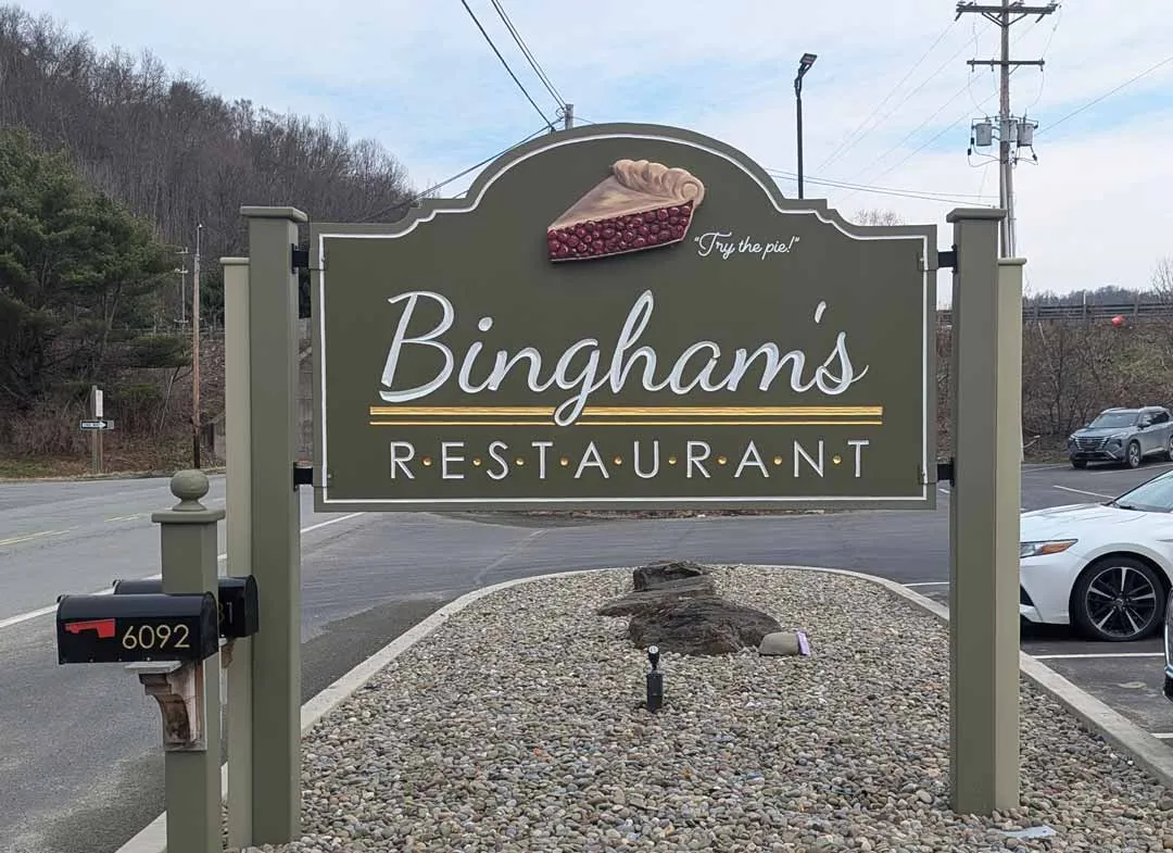 Carved post and panel sign for Bingham's Restaurant