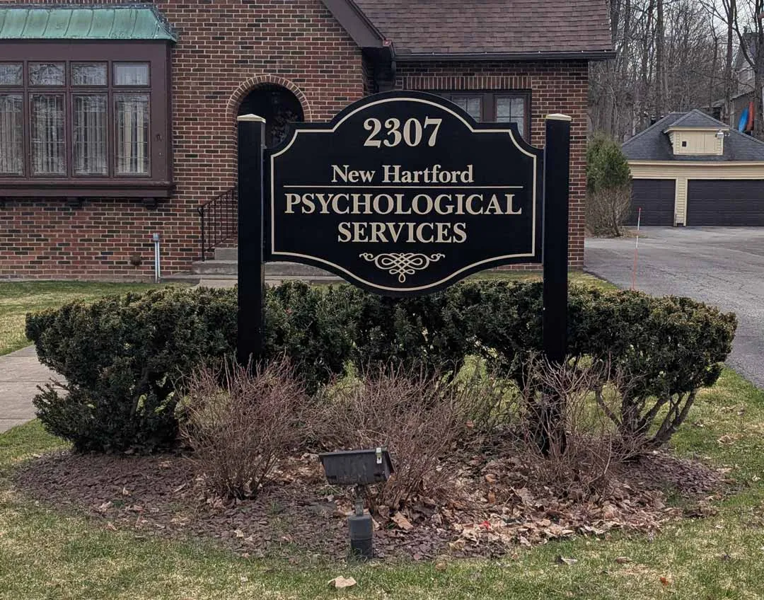 Carved post and panel sign for New Hartford Psychological