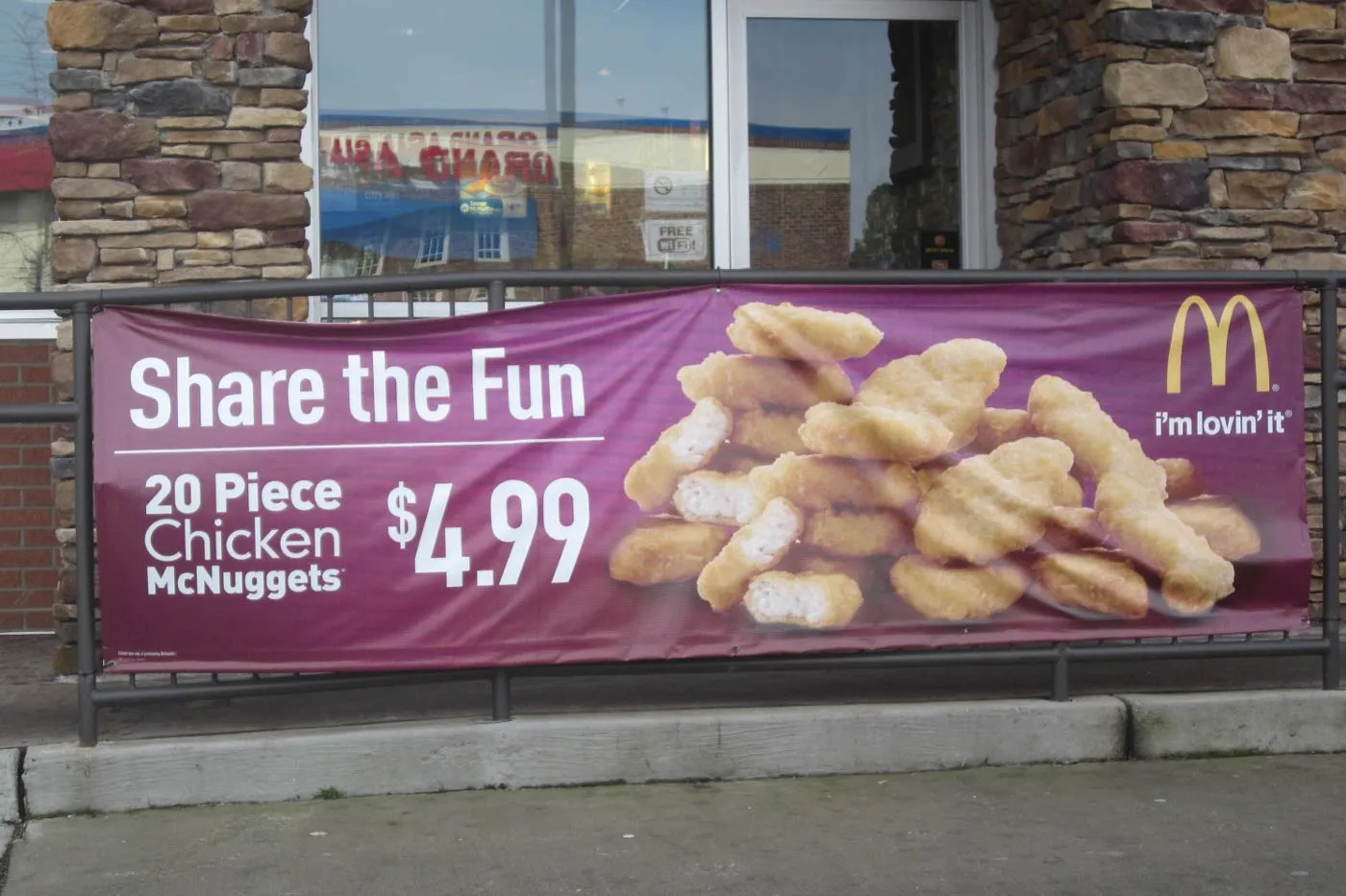 Vinyl banner on railing for McDonald's